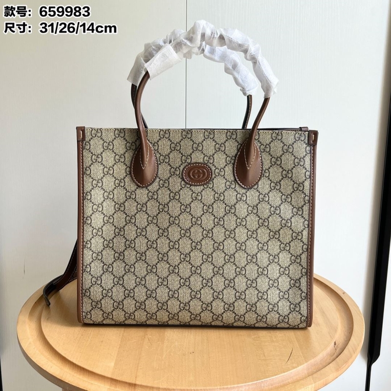 G*u*i shopping bags